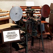 Early keystick-felting machine applying felt bushings